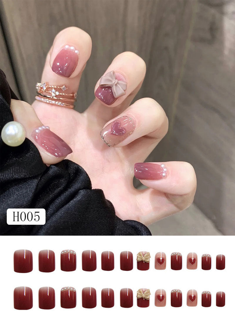 Finished Nail Manicure With Bow Knot Wearing Nails